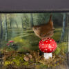Taxidermy Eurasian Wren in a handmade glass case with handmade mushroom and hand painted background by Krysten Newby