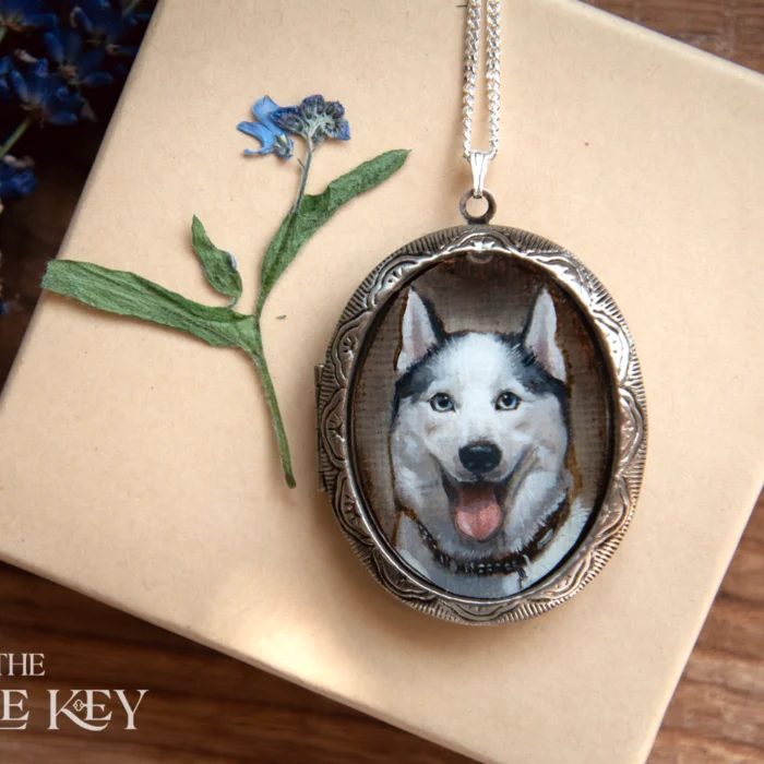 Handpainted portrait locket of your pet as a memorial with ashes